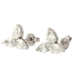 Cluster Pear Shape Diamond Earrings Weighing 2.56 Total Carat Weight in Platinum