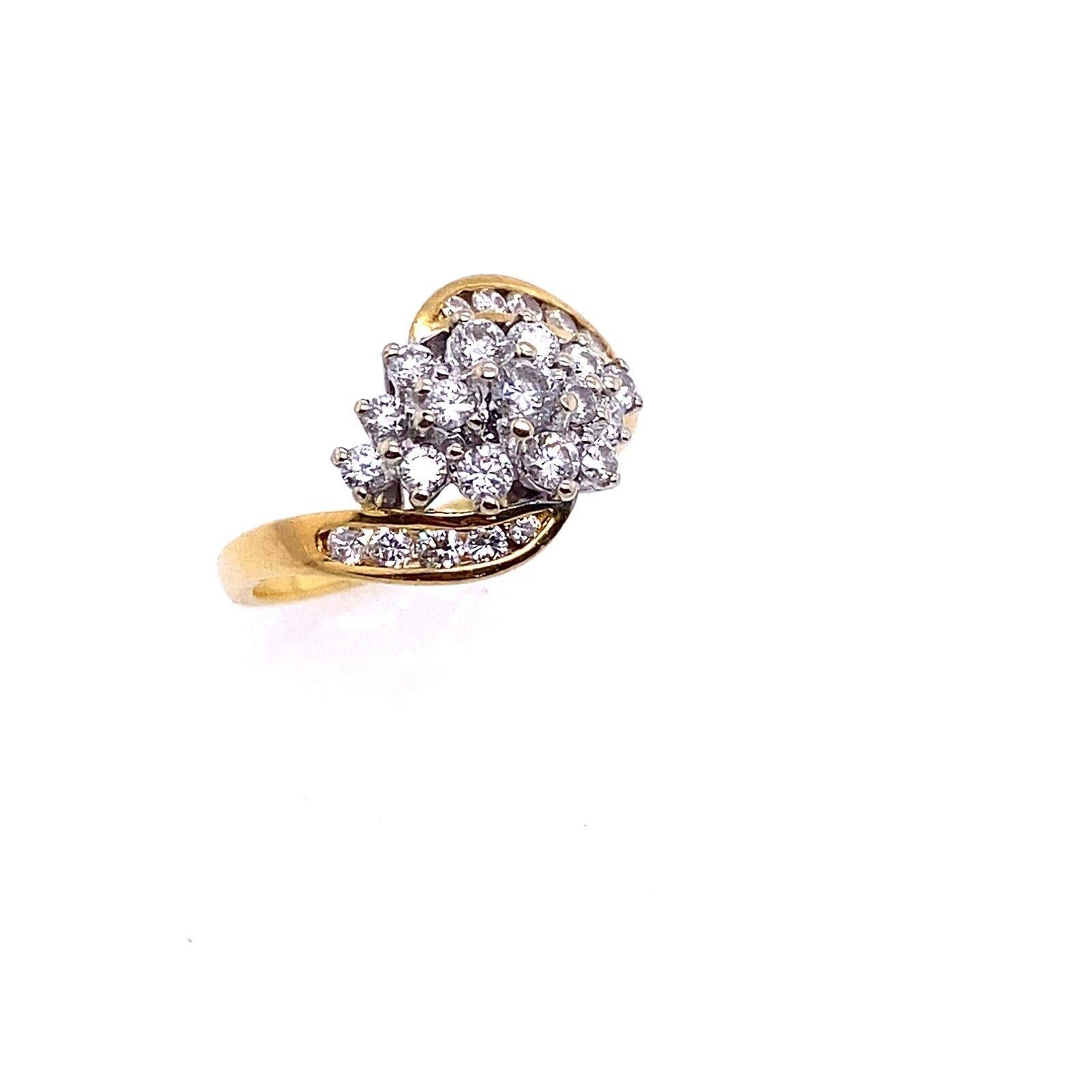 A cluster ring has a dazzling effect and is an excellent option for an engagement ring. This 18ct yellow and white gold ring is set with 0.70ct G/SI round brilliant cut diamonds and is accompanied by a Beaverbrooks Diamond Certificate.

Additional