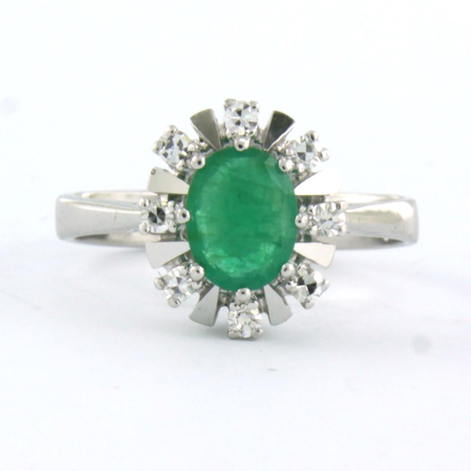 14k white gold ring set with emerald and single cut diamonds 0.16ct F/G VS/SI - ring size U.S. 7.5 - EU. 17.75 (56)

the top of the ring is 1.2 cm wide and 7.0 mm high

Ring size US 7.5 - EU. 17.75 (56), ring can be enlarged or reduced a few sizes