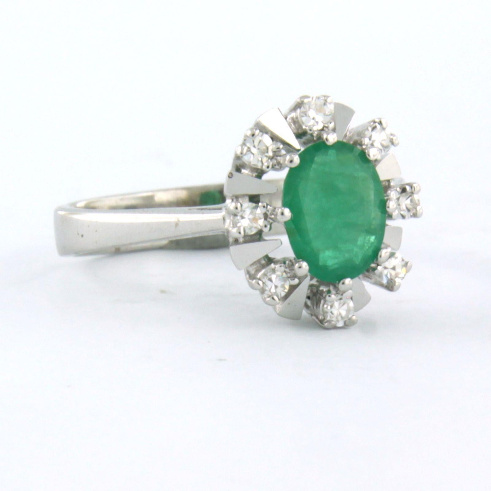 Modern Cluster ring set with emerald and diamonds up to 0.16ct 14k white gold For Sale