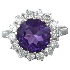 Cluster ring with amethyst en brilliant cut diamonds up to 1.00ct 14k white gold