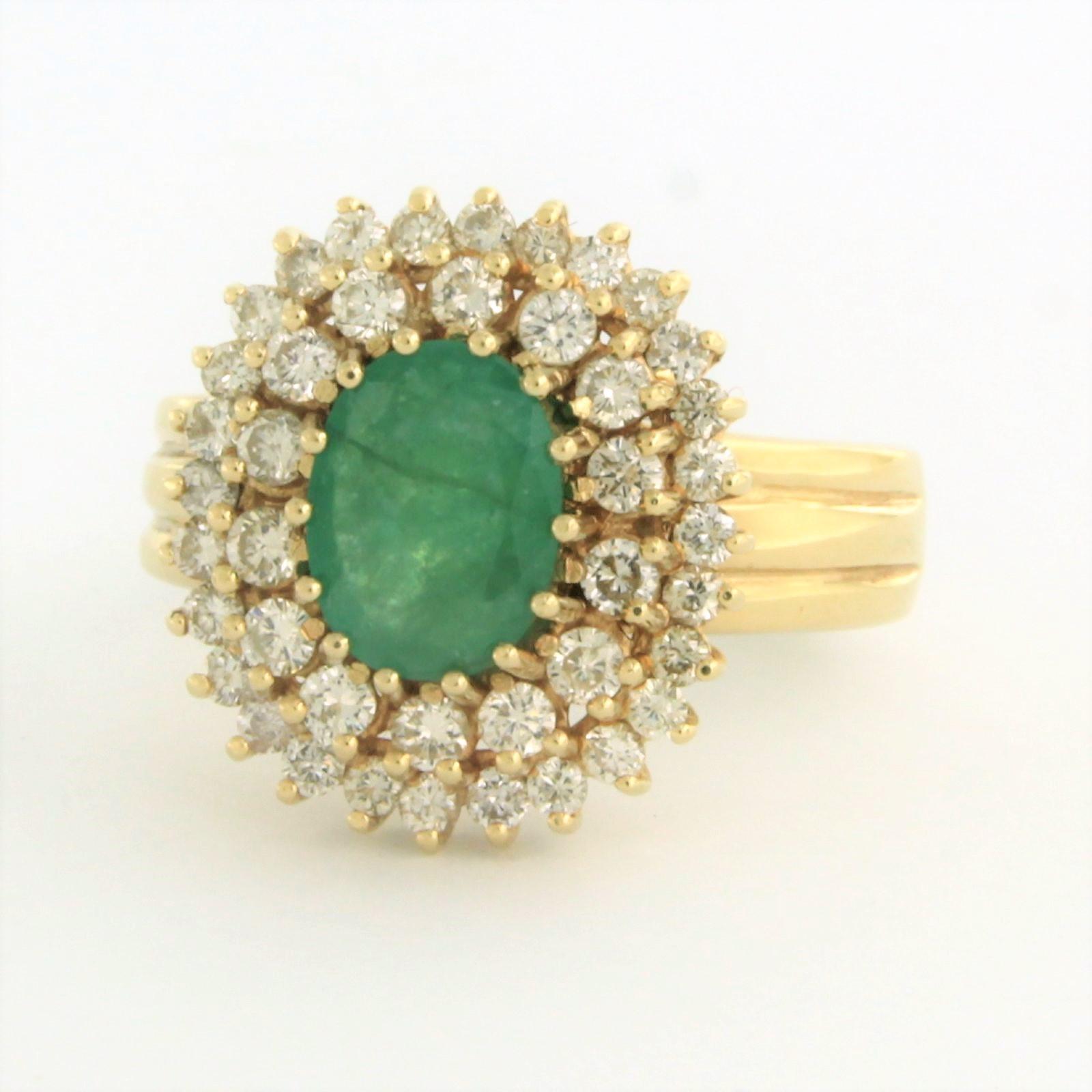 Modern Cluster Ring with emerald and diamonds 14k yellow gold For Sale