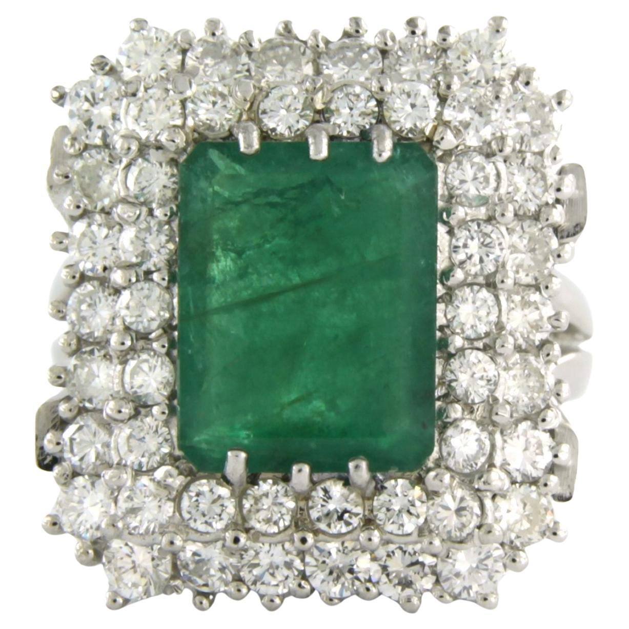 Cluster ring with emerald and diamonds 18k white gold