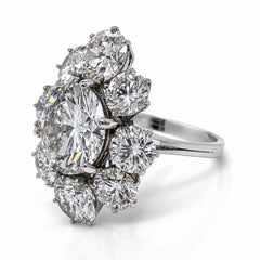 CLUSTER RING With GIA 6.33 Carat Round Diamond and 9.00 Carat in Platinum