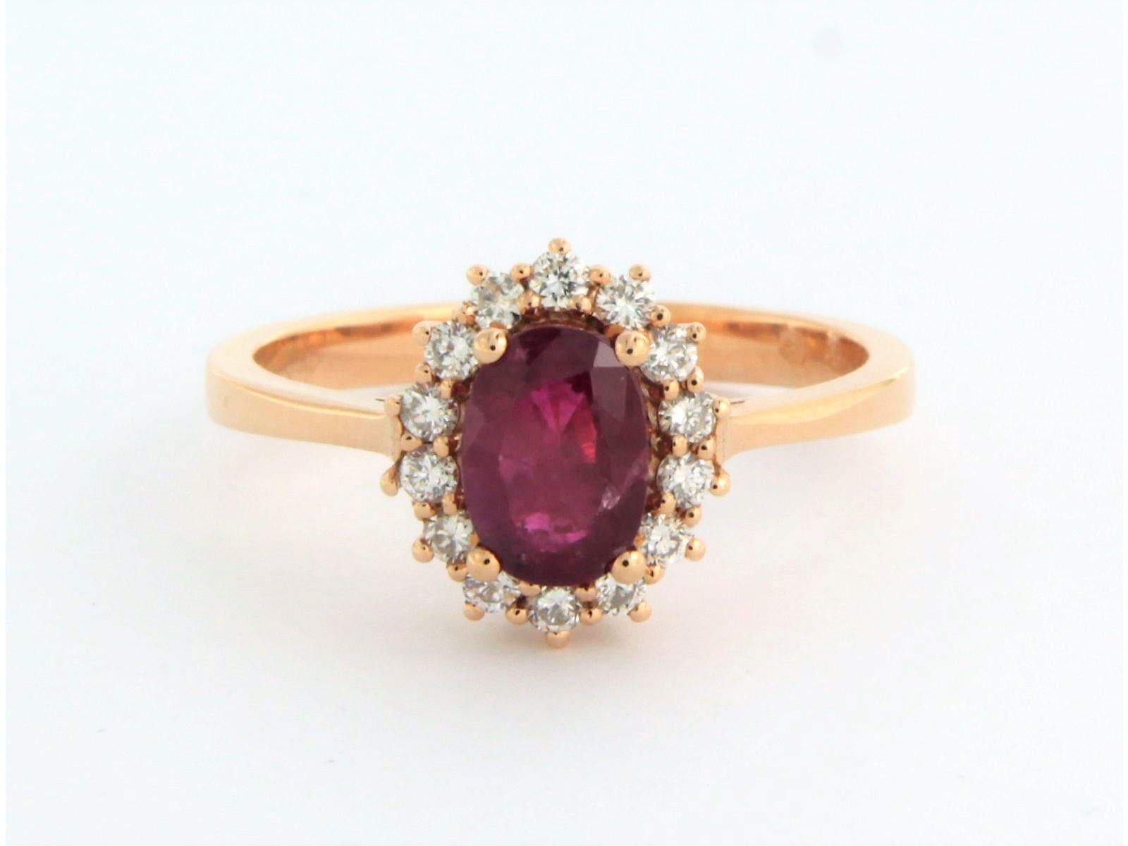 18k rose gold entourage ring set with a central ruby. 1.05ct and an entourage of brilliant cut diamonds up to. 0.26ct - F/G - VS/SI - ring size U.S. 7.25 - EU. 17.5 (55)

detailed description:

The top of the ring is in an oval shape measuring 1.1