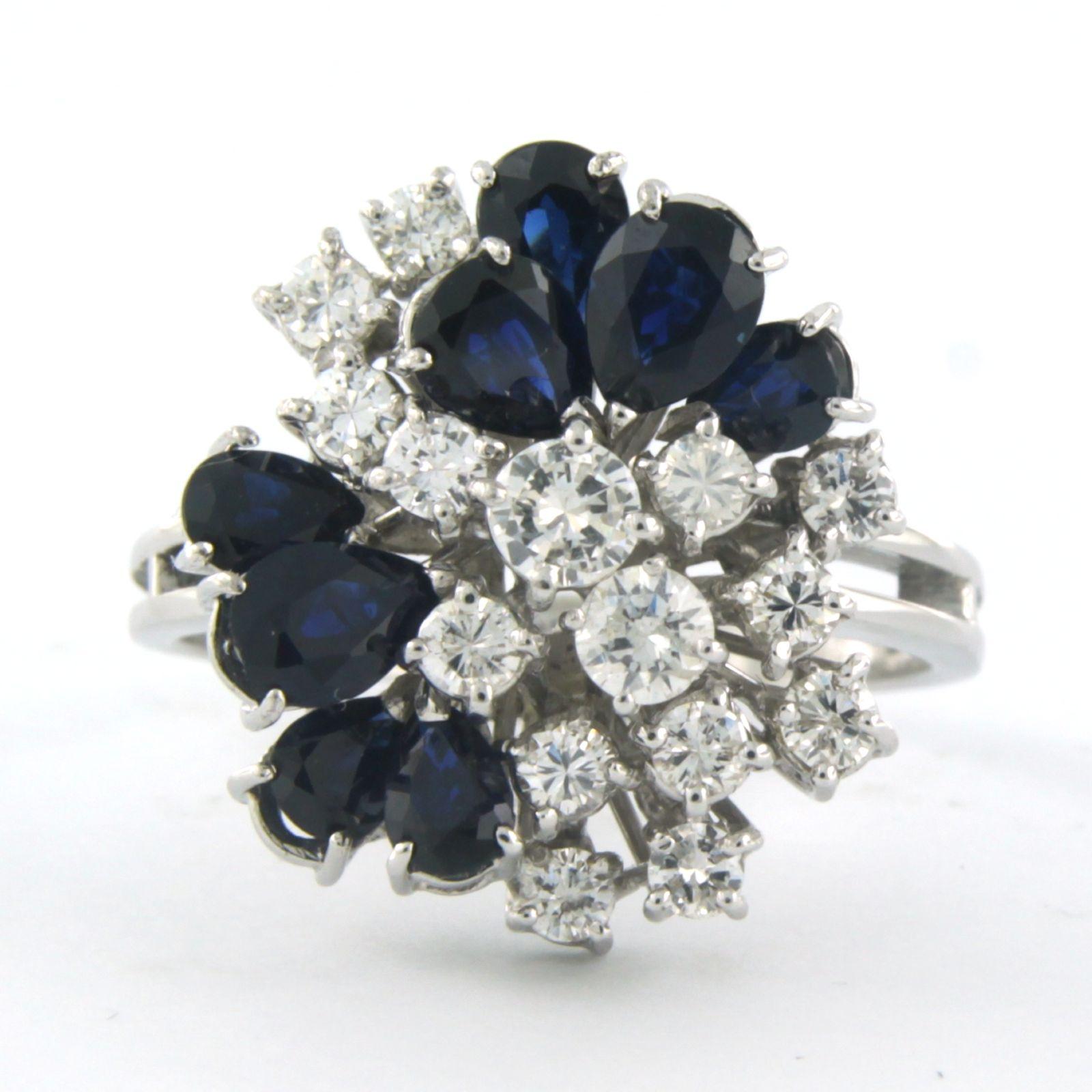 14 kt white gold ring set with sapphire and brilliant cut diamond tot. 1.10 ct - F/G - VS/SI - ring size U.S. 9 - EU. 19(60)

detailed description:

The top of the ring is 1.9 cm wide by 1.1 cm high

Weight 7.5 grams

ring size U.S. 9 - EU. 19(60),