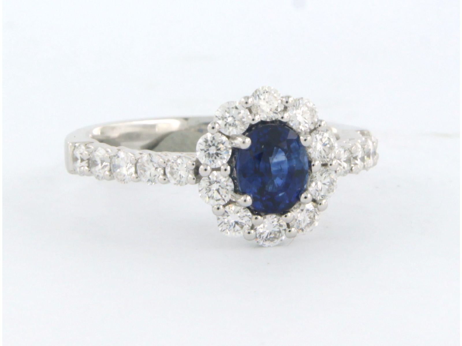 Modern Cluster ring with sapphire up to 0.90ct and diamonds up to 0.90ct 18k white gold For Sale