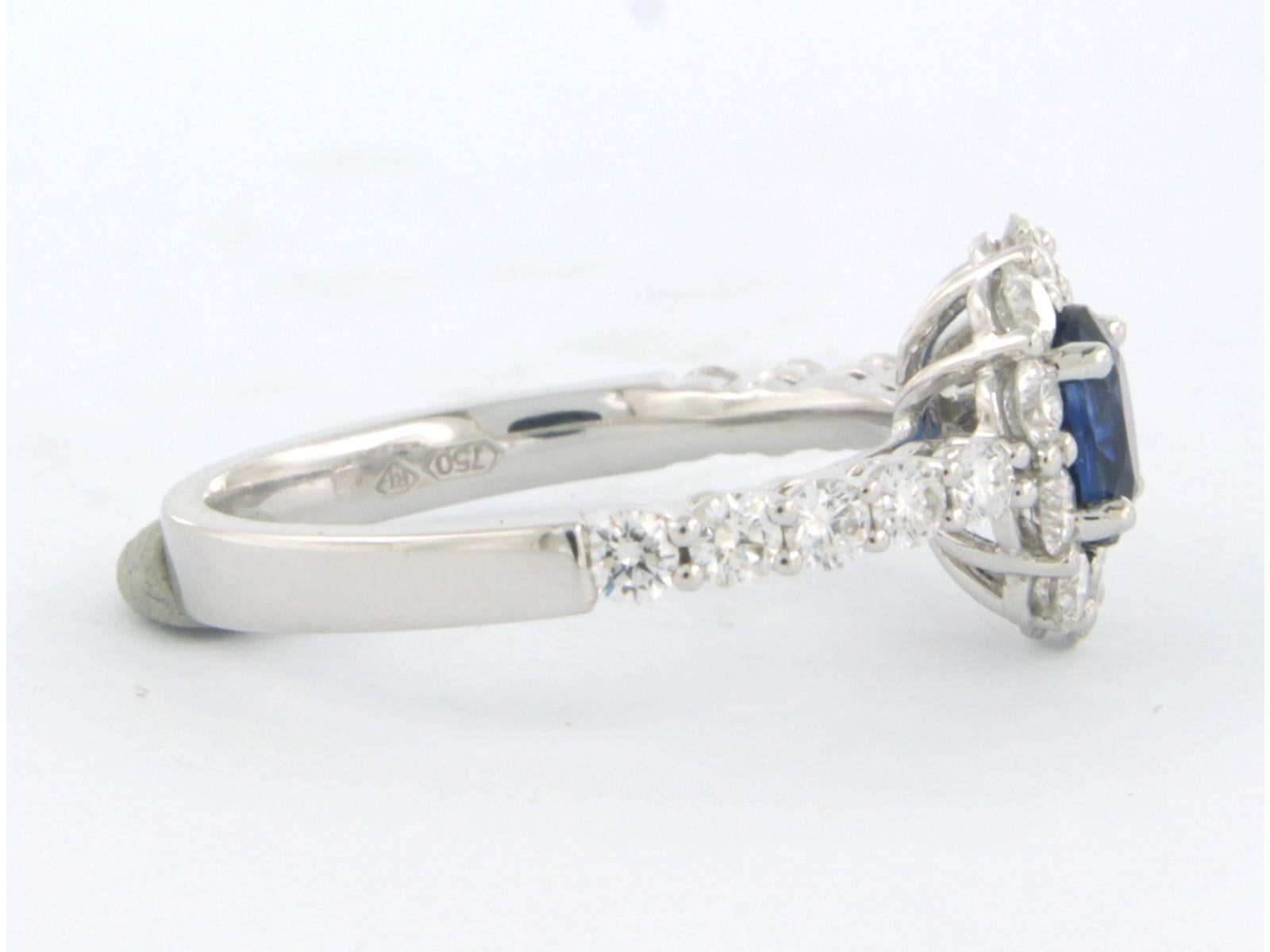 Cluster ring with sapphire up to 0.90ct and diamonds up to 0.90ct 18k white gold For Sale 1