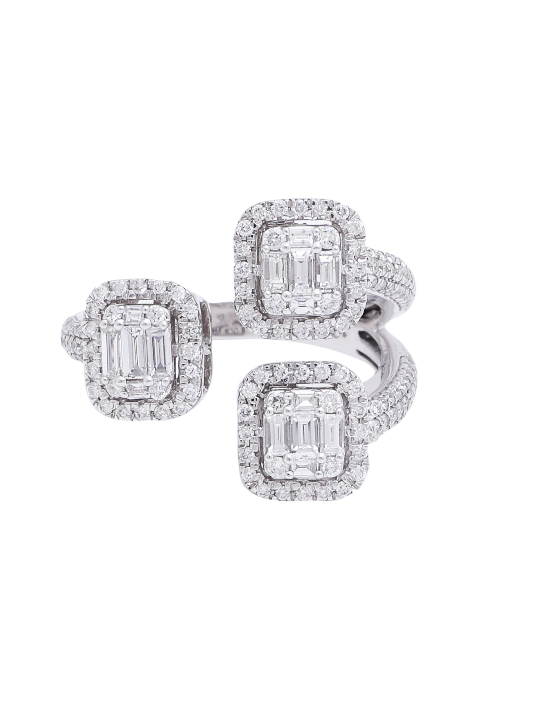 A ring with small diamond Baguettes and Rounds coming to form 3 big Emerald cut diamonds. The small stones are set in a cluster to give an impression of a bigger stone.
The design is a classic and elegant 3 stone ring. 
There is total 1.38 carats