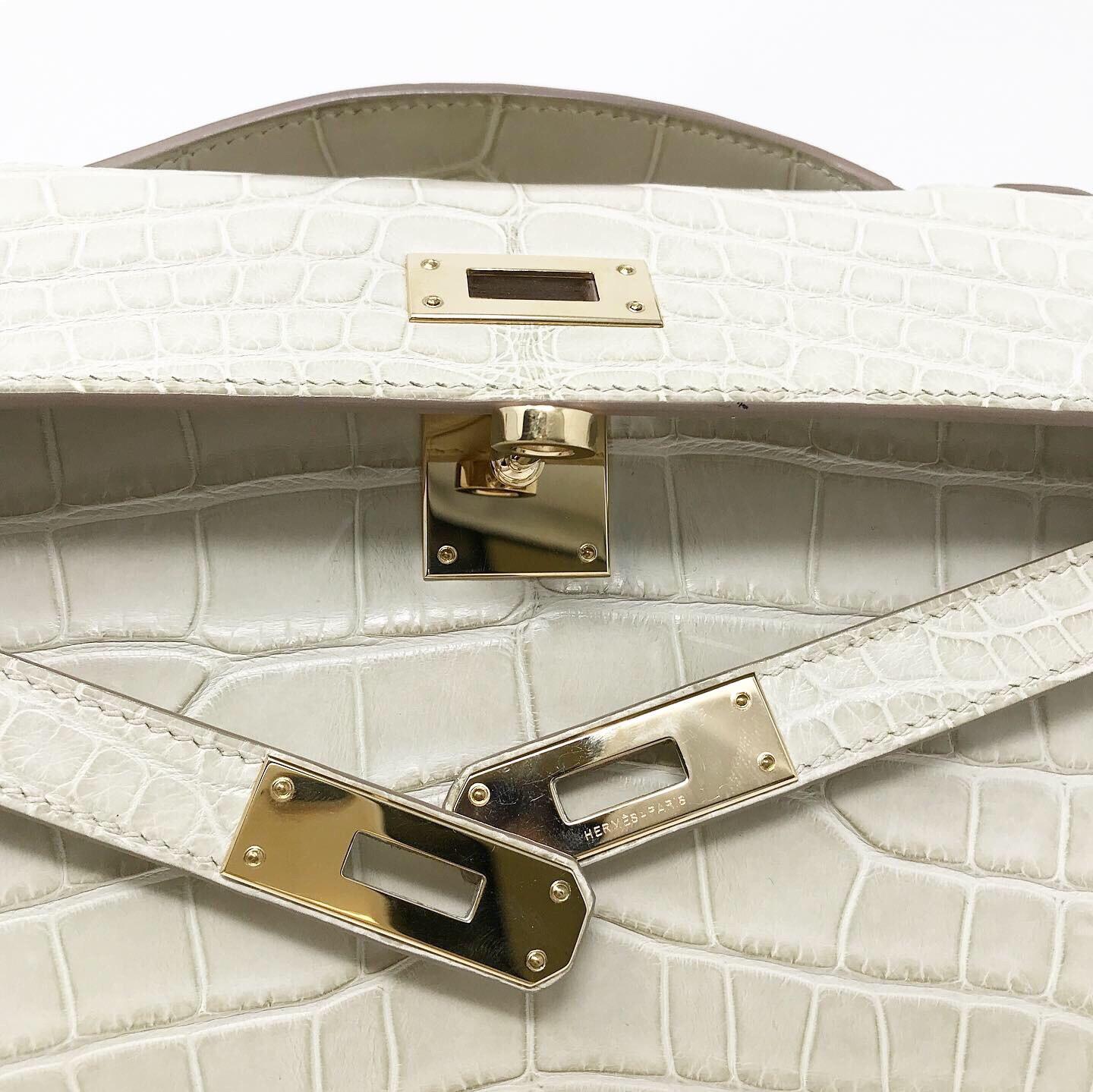 Clutch Kelly Cut Alligator Beton 2013 1