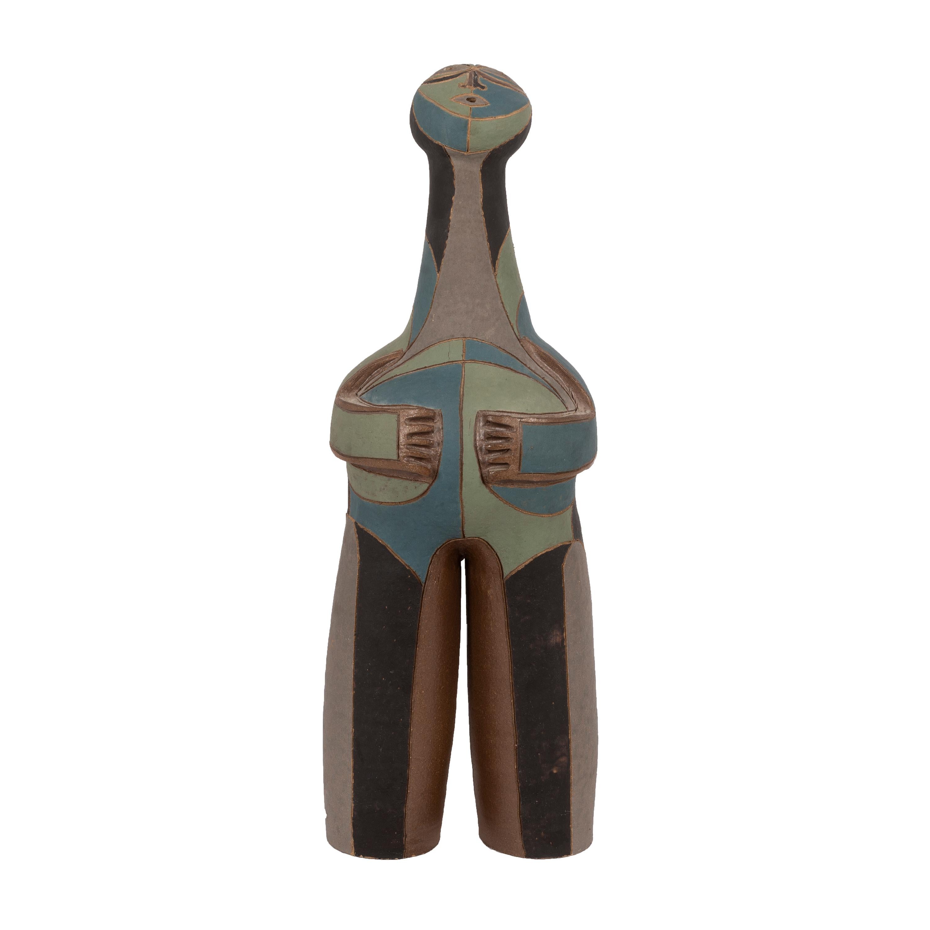 Clyde Burt figural ceramic sculpture in hand painted and glazed stoneware.
Signature to underside: [CB].