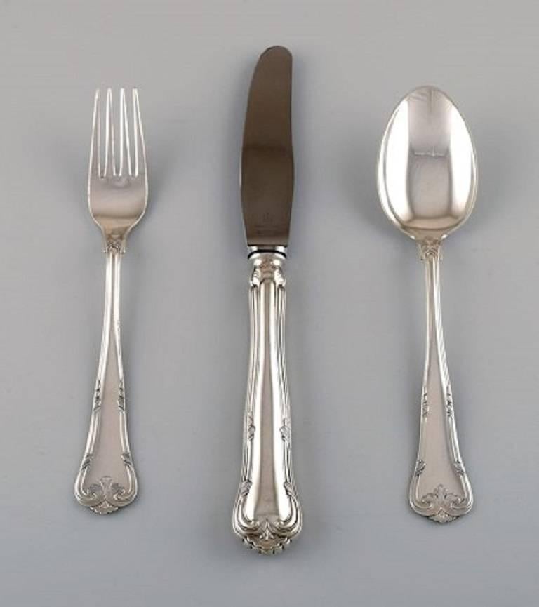 C.M. Cohr, huit couverts de table complets 