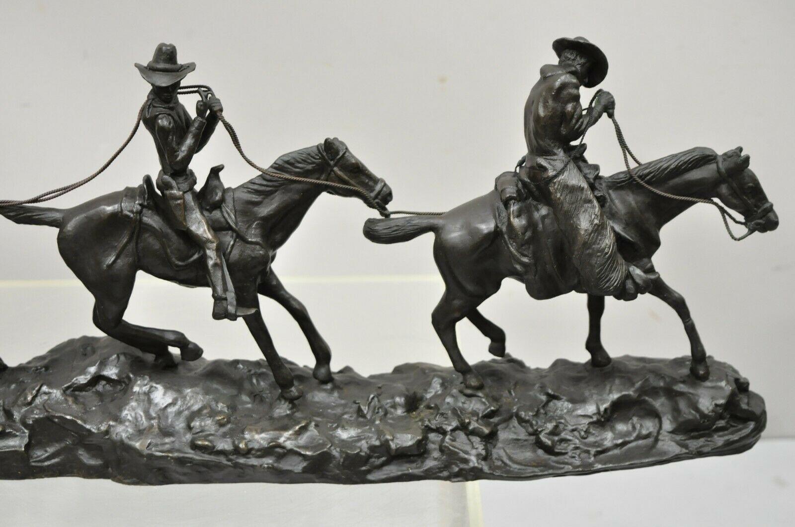russell bronze statues