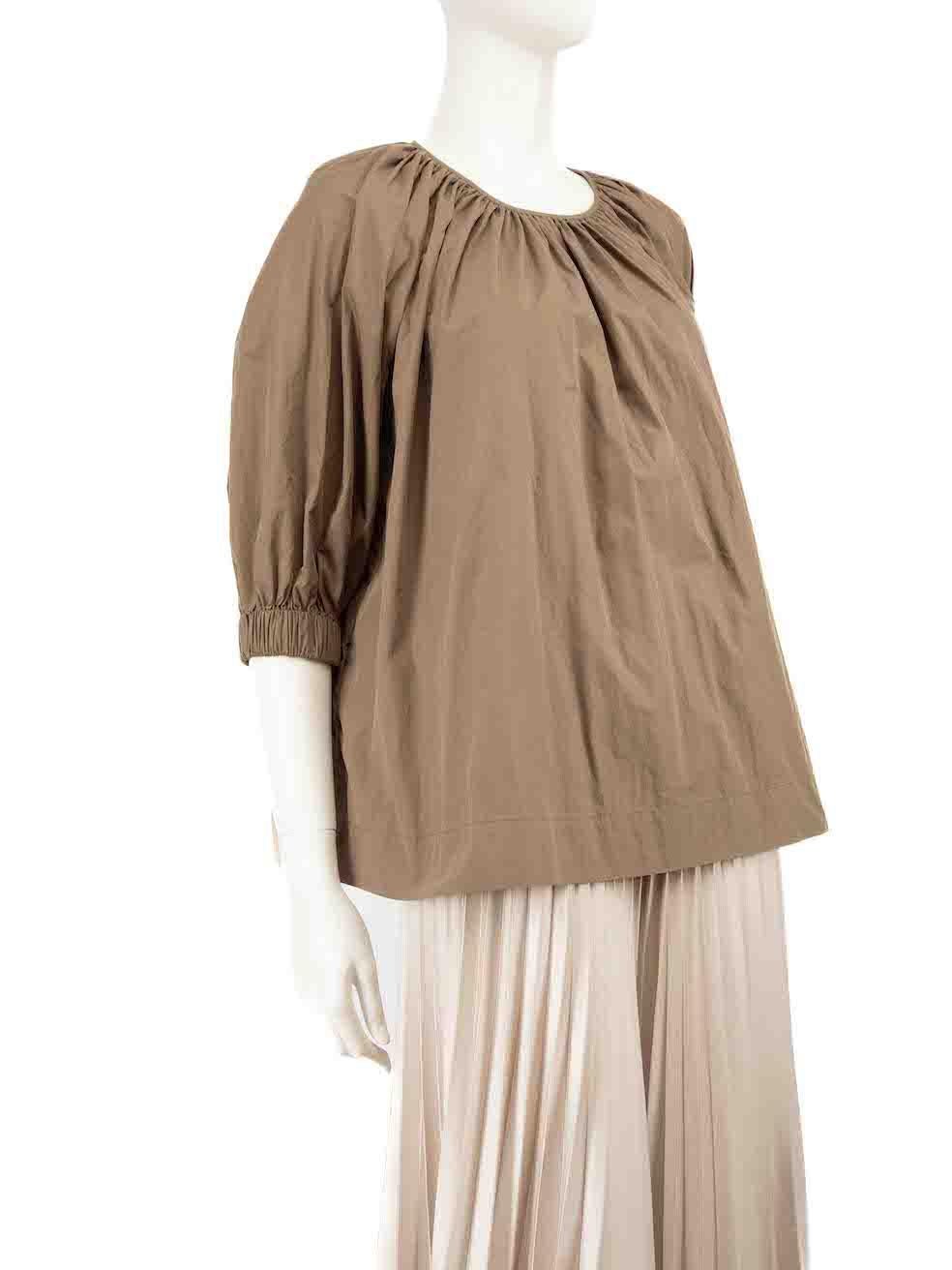 CONDITION is Very good. Hardly any visible wear to top is evident on this used CO designer resale item.
 
 
 
 Details
 
 
 Brown
 
 Cotton
 
 Top
 
 Short puff sleeves
 
 Round neck
 
 2x Side pockets
 
 Back button fastening
 
 
 
 
 
 Made in