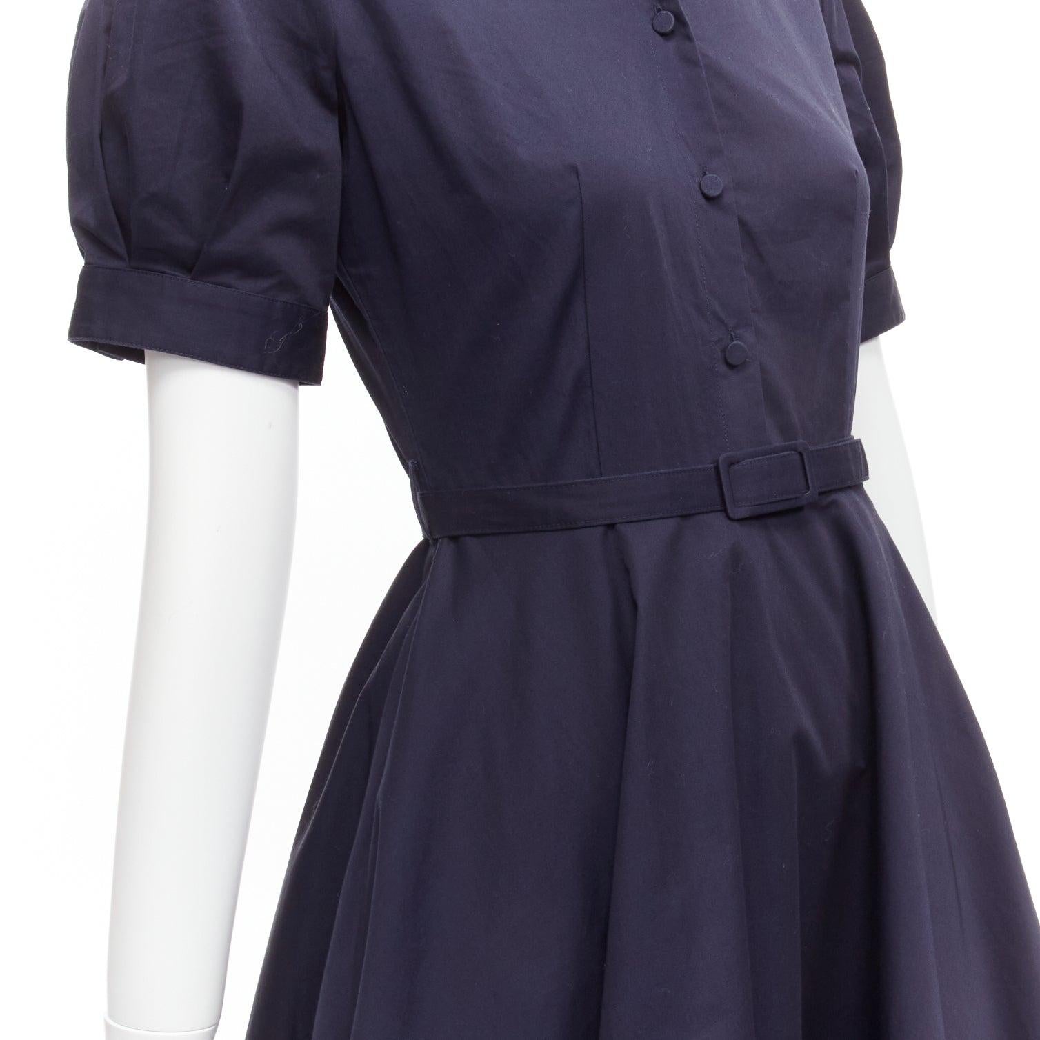 CO COLLECTION navy cotton poplin panelled hem button down belted dress XS
Reference: SNKO/A00419
Brand: Co.
Material: Cotton
Color: Navy
Pattern: Solid
Closure: Button
Made in: China

CONDITION:
Condition: Good, this item was pre-owned and is in