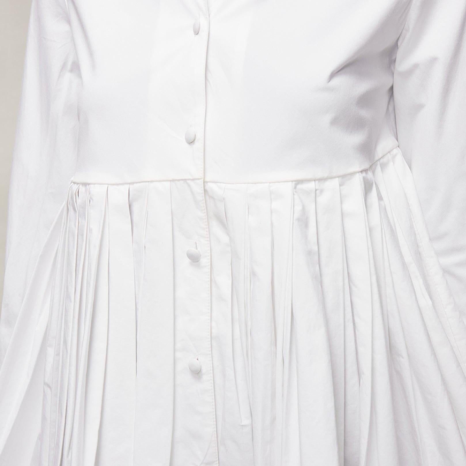 CO COLLECTIONS camicia in cotone bianco a vita alta con peplo plissettato US0 XS
Riferimento: EALU/A00009
Marchio: Collection'S
Materiale: Cotone
Colore: bianco
Modello: Tinta unita
Chiusura: bottone
Prodotto in: Cina

CONDIZIONE:
Condizioni: Molto