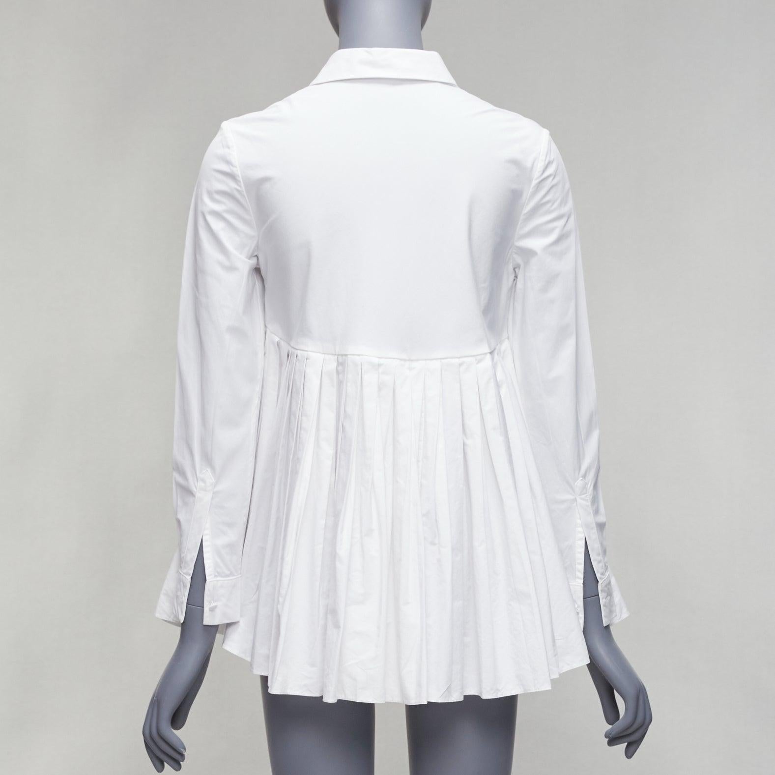 Donna CO COLLECTIONS camicia in cotone bianco a vita alta con peplo plissettato US0 XS in vendita