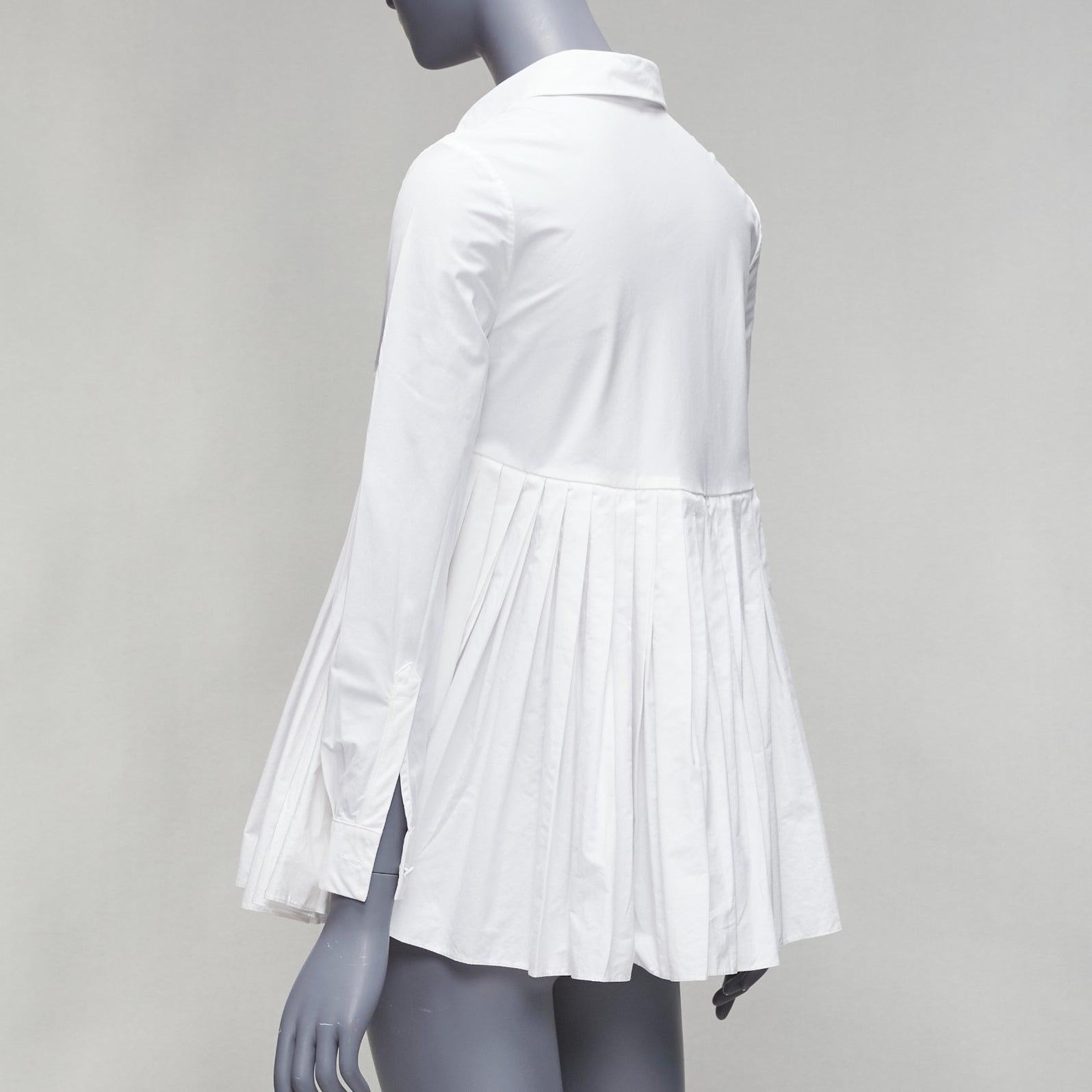 CO COLLECTIONS camicia in cotone bianco a vita alta con peplo plissettato US0 XS in vendita 1