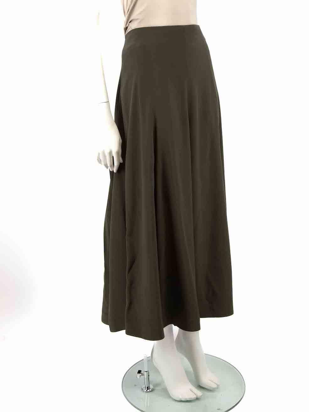 CONDITION is Very good. Minimal wear to skirt is evident. Minimal wear to the rear with light marks on this used CO designer resale item.
 
 Details
 F/W20
 Green
 Synthetic
 Pleated skirt
 Midi length
 Side zip closure with hook and eye
 
 
 Made