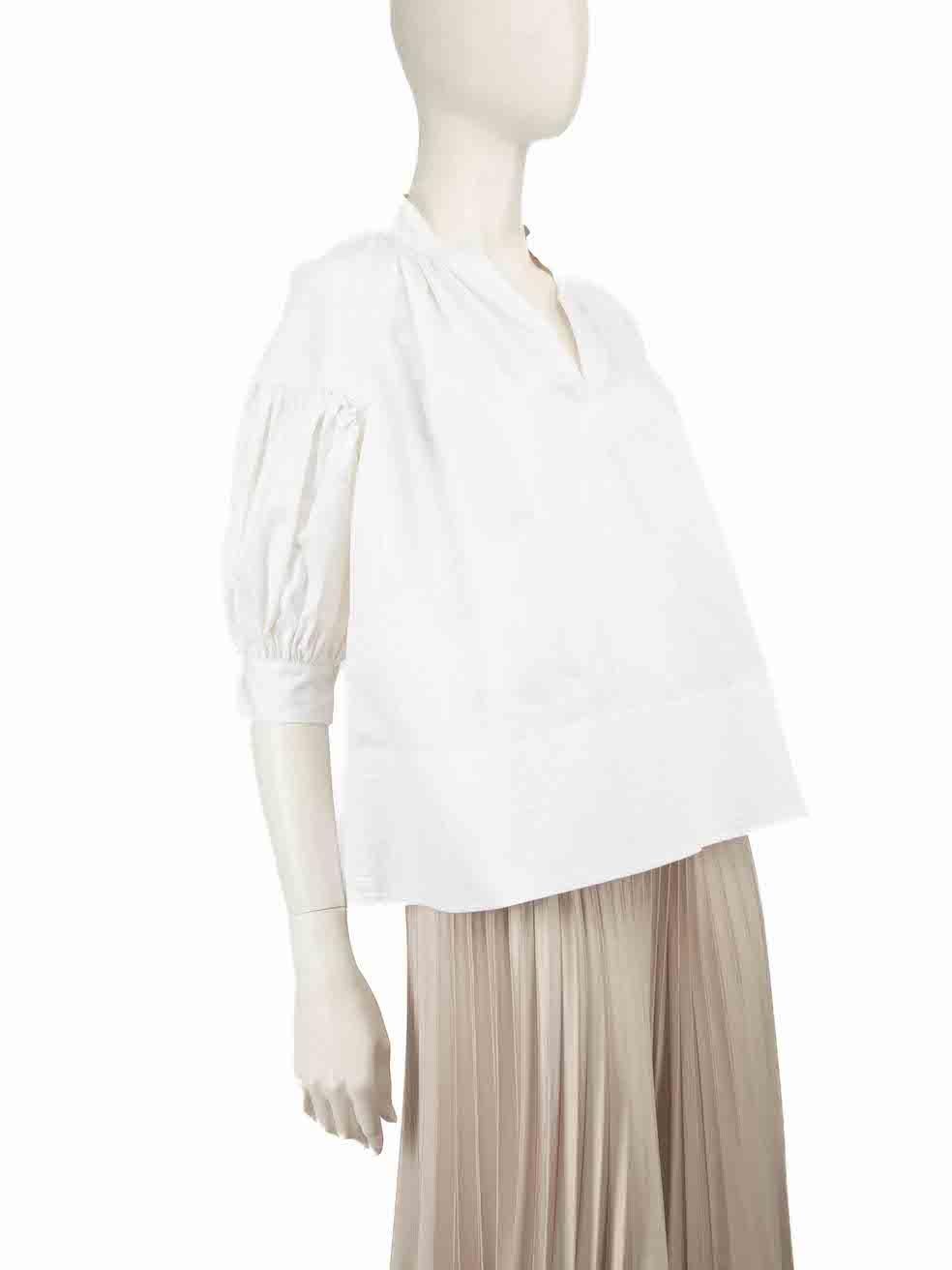 CONDITION is Very good. Hardly any visible wear to top is evident on this used CO designer resale item.
 
 
 
 Details
 
 
 White
 
 Cotton
 
 Top
 
 Short puff sleeves
 
 V-neck
 
 Buttoned cuffs
 
 
 
 
 
 Made in China
 
 
 
 Composition
 
 100%