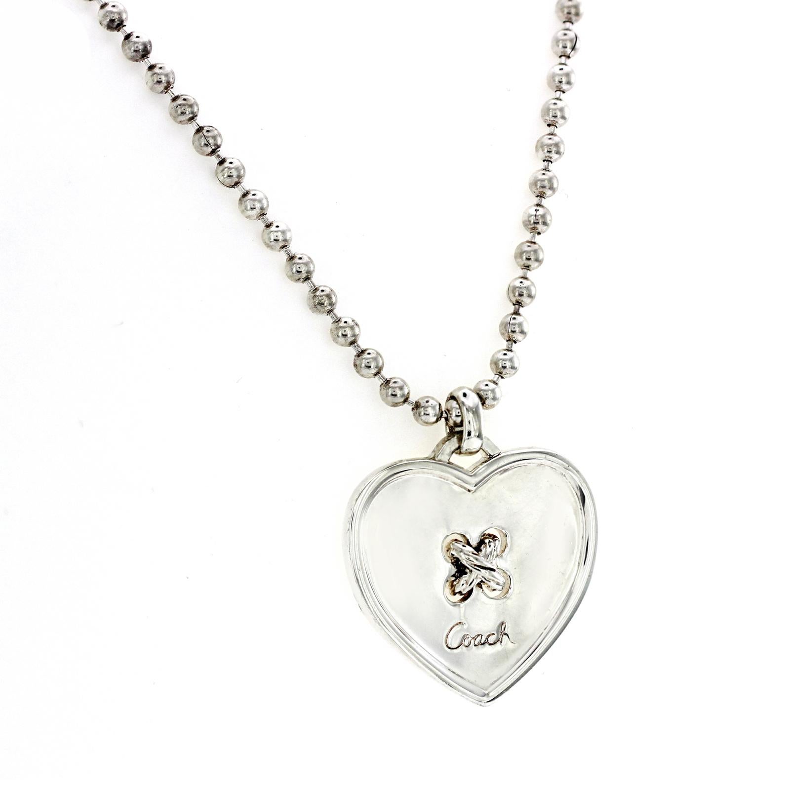 100% Authentic, 100% Customer Satisfaction

Pendant: 25 mm

Chain: 3 mm

Size: 16 Inches

Metal: 925 Sterling Silver

Hallmarks: Coach 925

Total Weight: 22.7 Grams

Stone Type: No Stone

Condition: Pre Owned 

Estimated Price: $650

Stock Number: