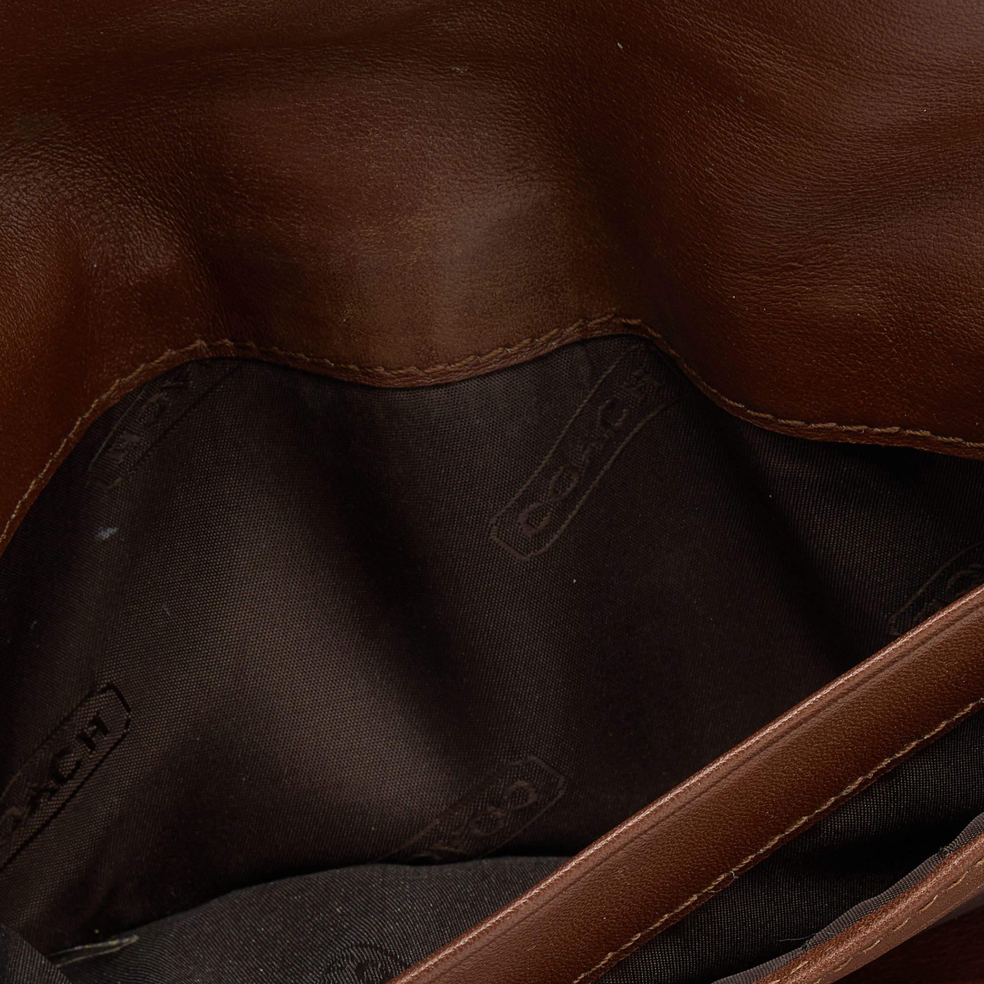 Showcasing an exclusive design from Coach  this wallet makes for a convenient accessory. Created from signature canvas and leather  its compartmentalized interior will keep your essentials organized and it is secured with a buckle clsoure on the