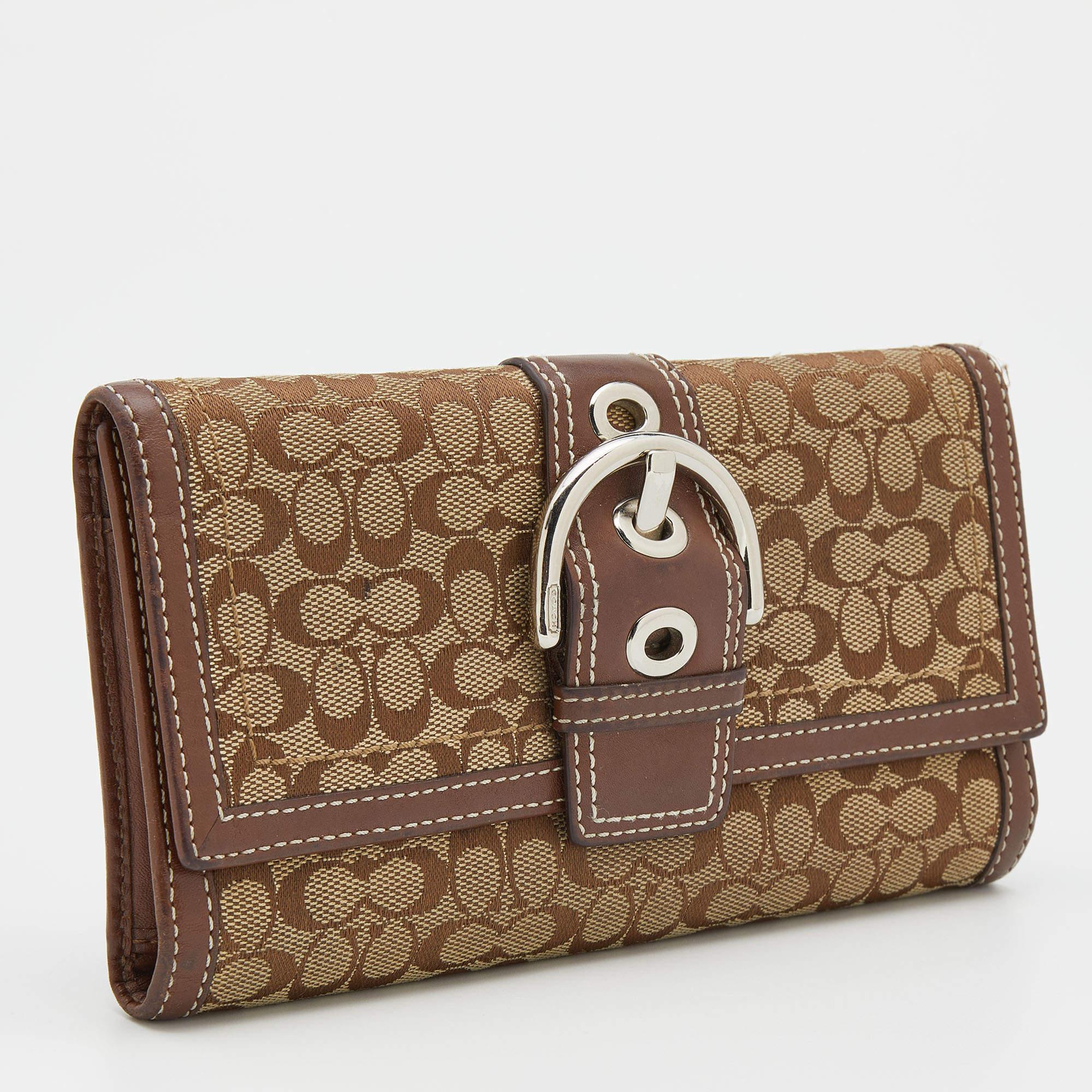 Coach Beige/Brown Signature Canvas and Leather Buckle Detail Continental Wallet In Good Condition In Dubai, Al Qouz 2
