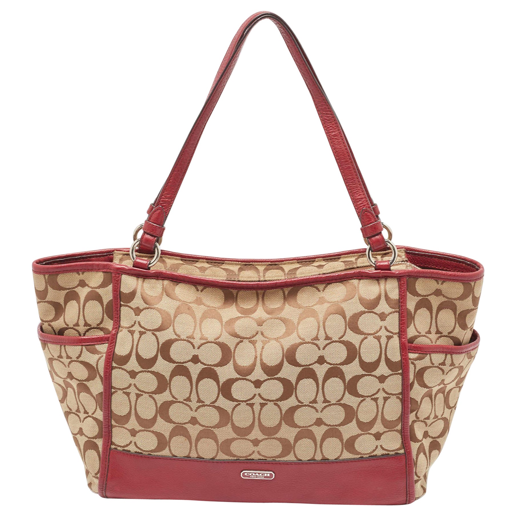 Coach Beige/Burgundy Signature Canvas and Leather Carrie Tote