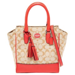 Coach Beige/Coral Pink Signature Canvas and Leather Tassel Tote