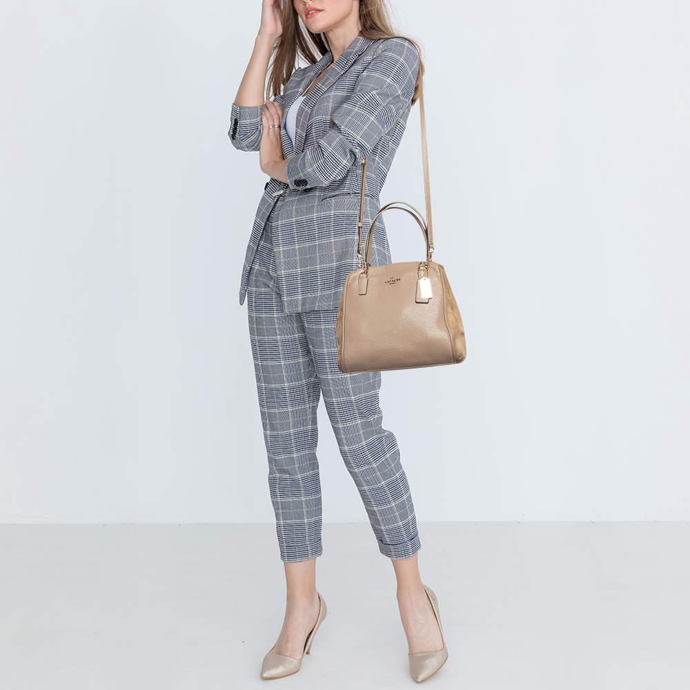 This satchel is rendered in the finest quality materials into an elegant design. Versatile and functional it is well sized for your daily use.