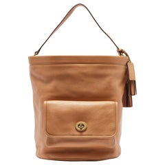 Coach Beige Leather Legacy Tassel Bucket Bag
