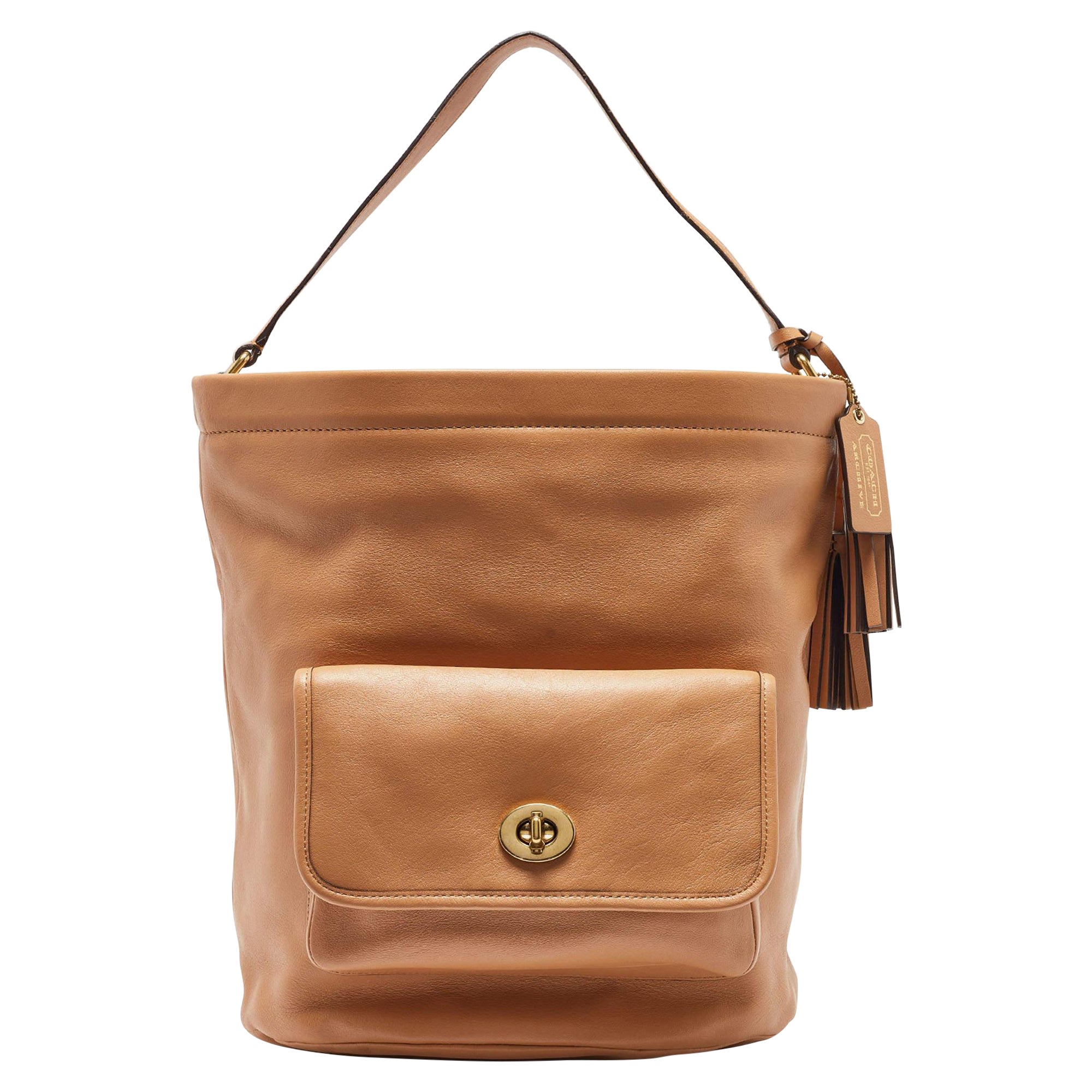 Coach Beige Leather Legacy Tassel Bucket Bag