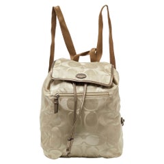 Used Coach Beige/Metallic Signature Nylon and Leather Backpack