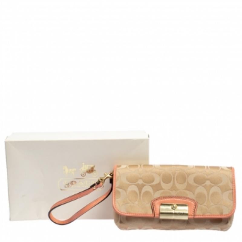 Coach Beige/Orange Signature Canvas and Leather Wristlet Clutch For Sale 5