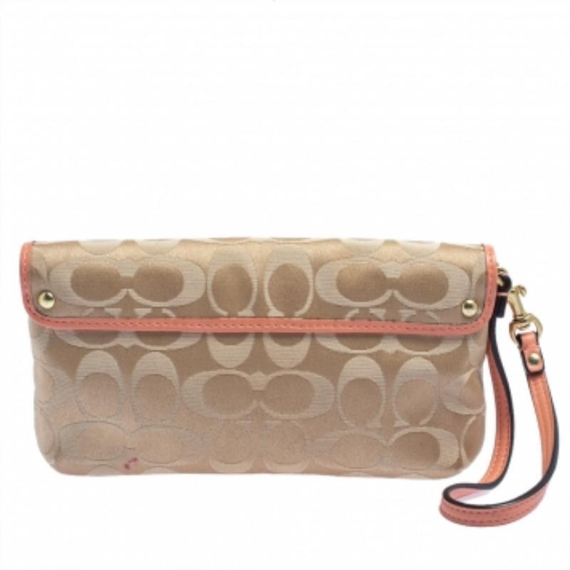 Women's Coach Beige/Orange Signature Canvas and Leather Wristlet Clutch For Sale