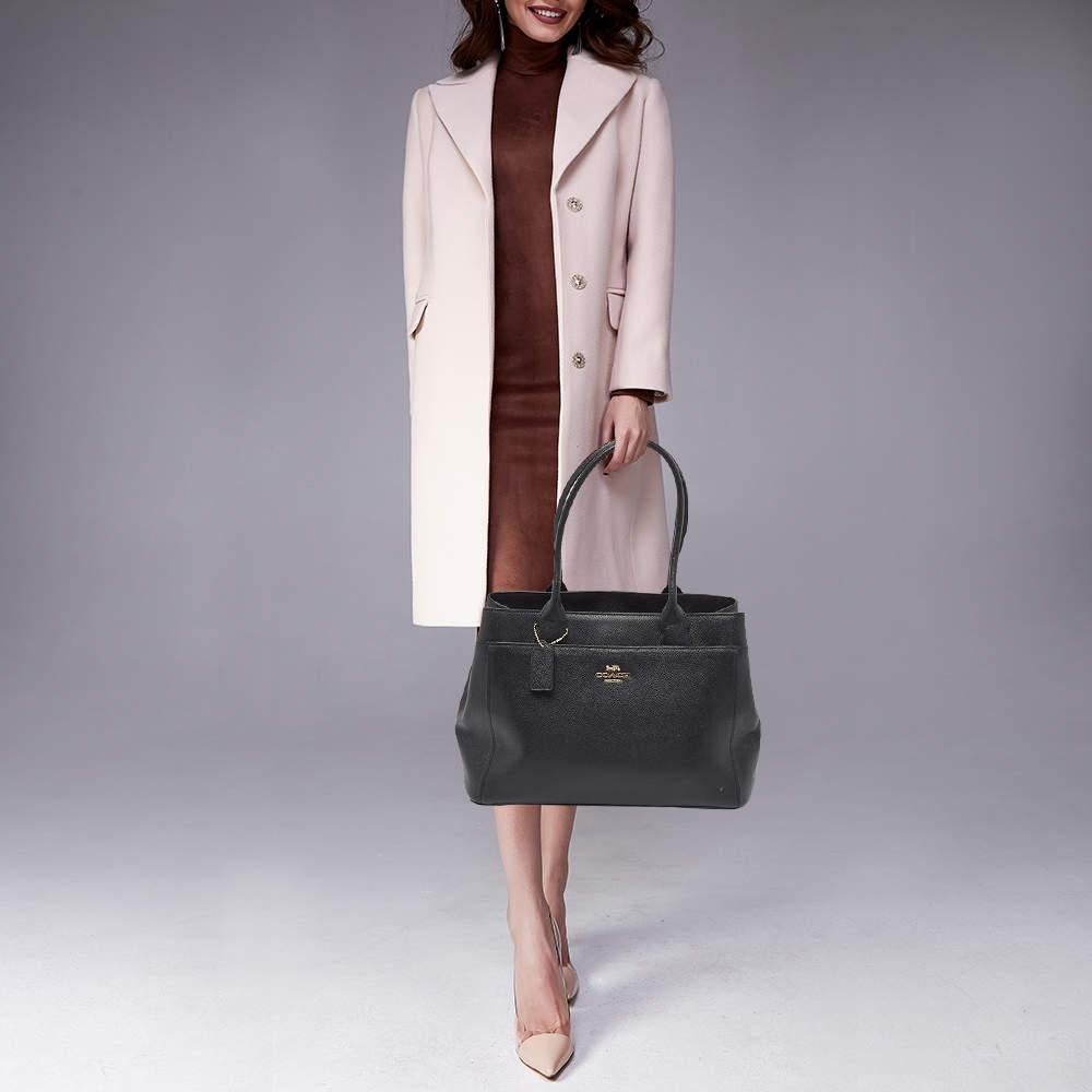 This alluring tote bag for women has been designed to assist you on any day. Convenient to carry and fashionably designed  the tote is cut with skill and sewn into a great shape. It is well equipped to be a reliable accessory.