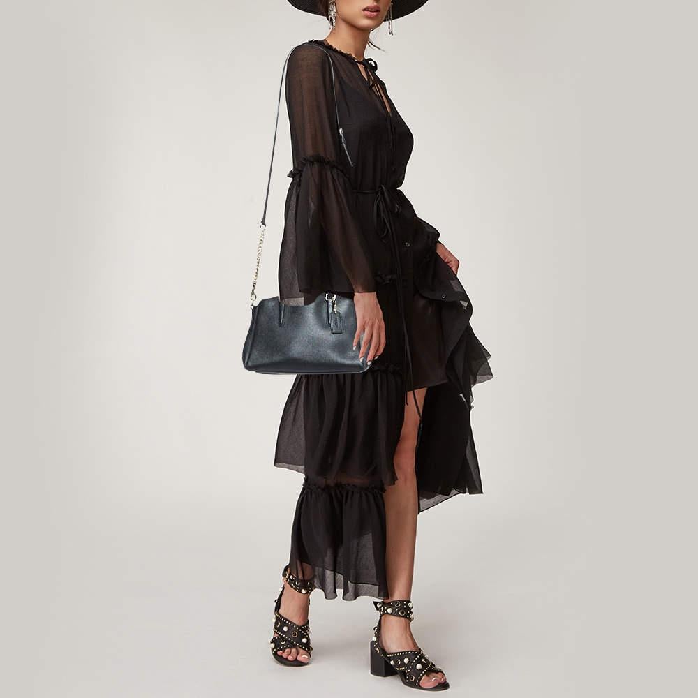 This satchel is rendered in the finest quality materials into an elegant design. Versatile and functional, it is well-sized for your daily use.