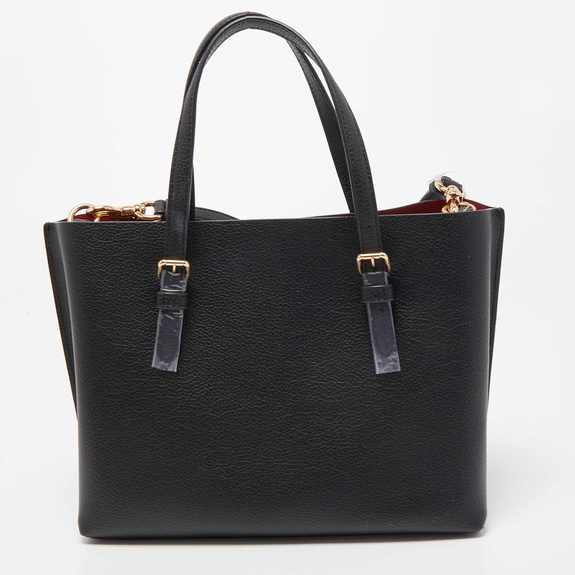 This beautiful Mollie tote from Coach is highly functional and full of charm. It is made using leather on the exterior with gold-toned hardware completing its fittings. It contains a study shape, dual handles, and a shoulder strap.

Includes: Info