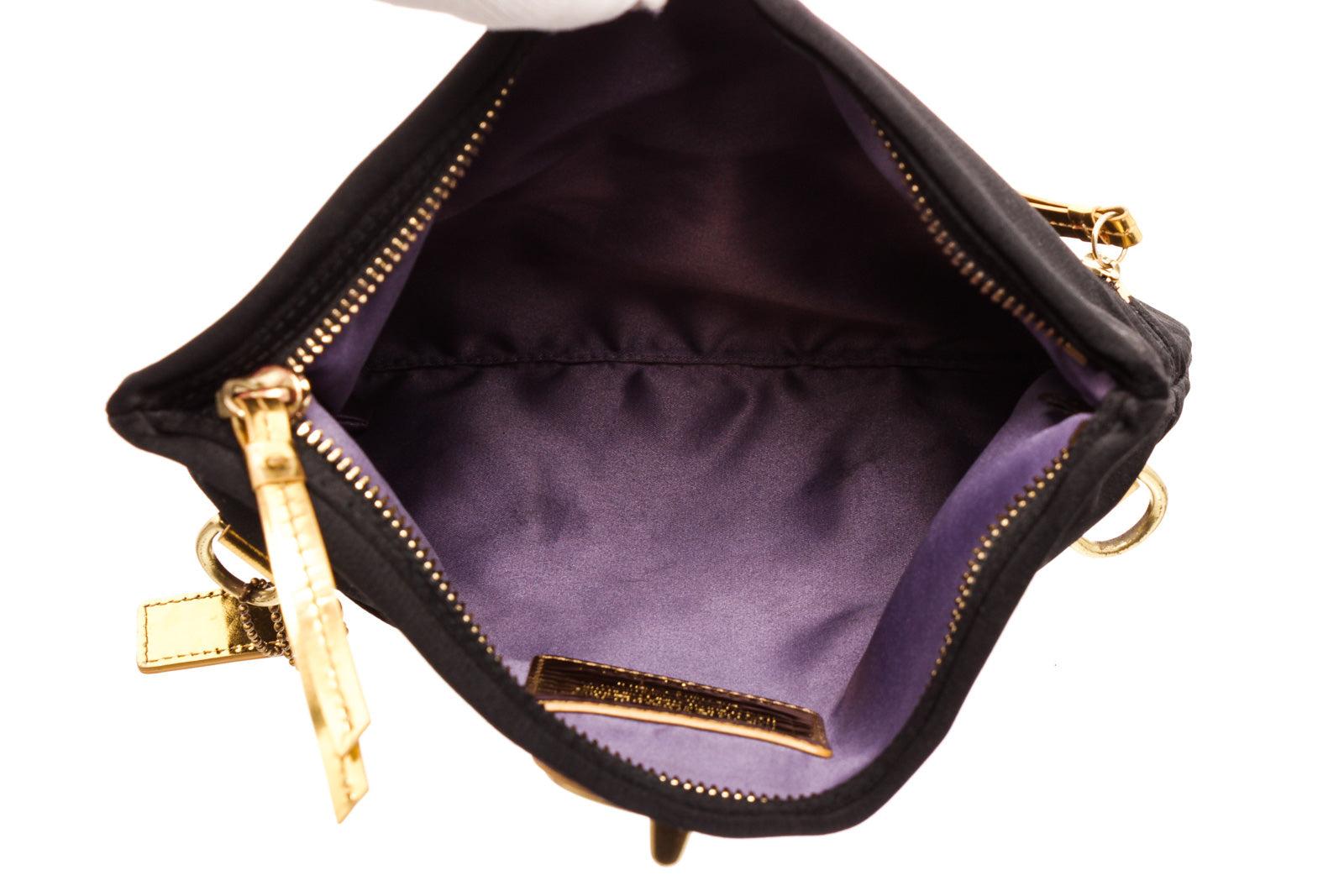 Coach black satin Amanda clutch with gold-tone hardware, logo placard at front In Excellent Condition In Irvine, CA
