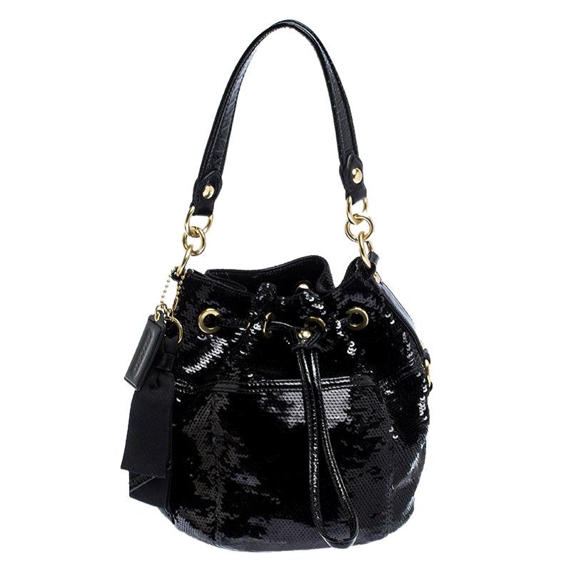 coach leather drawstring backpack