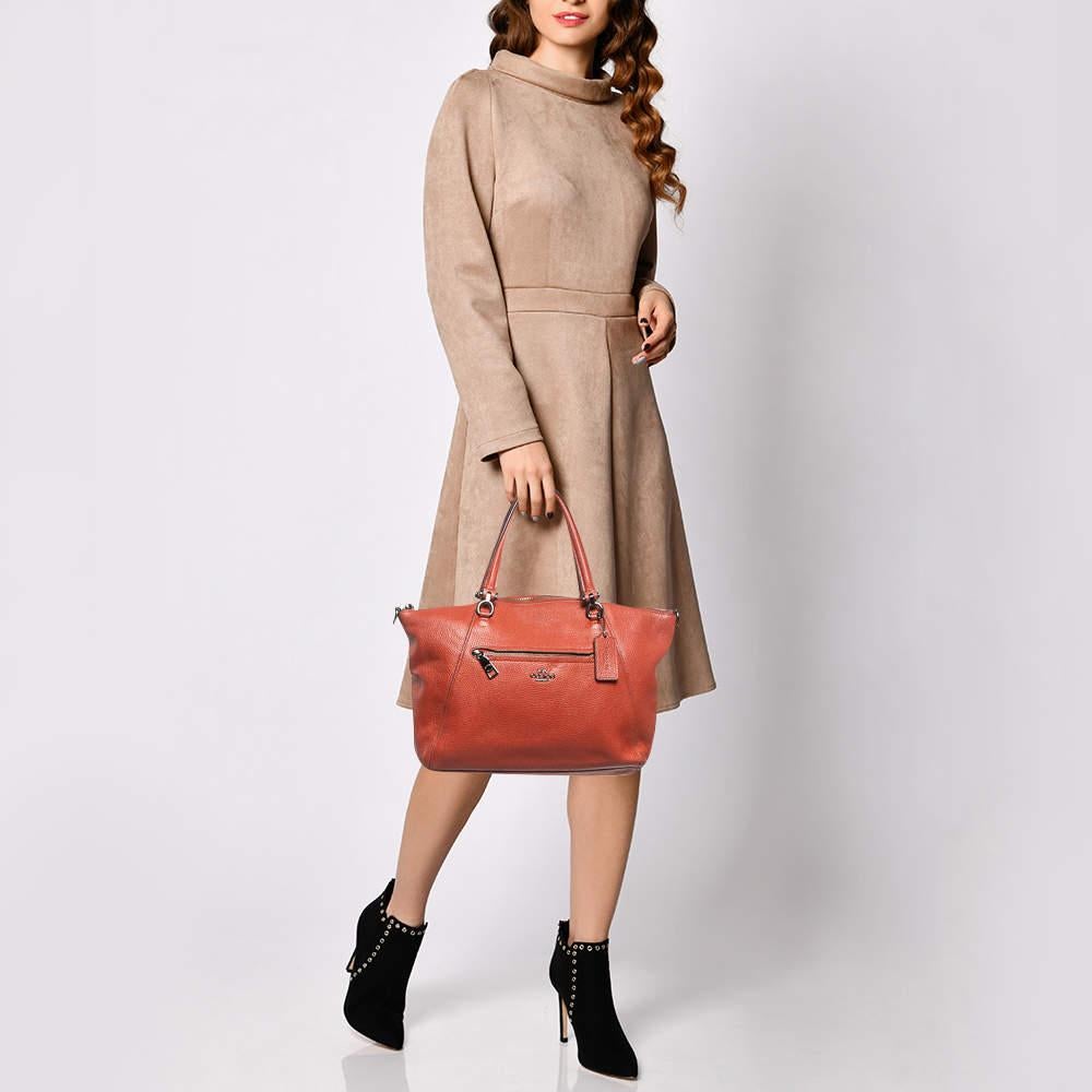 This satchel is rendered in the finest quality materials into an elegant design. Versatile and functional it is well sized for your daily use.
