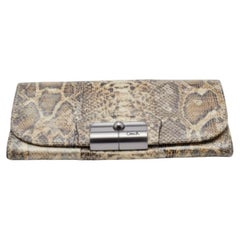 Cartera continental con solapa de piel repujada de pitón marrón/beige Coach