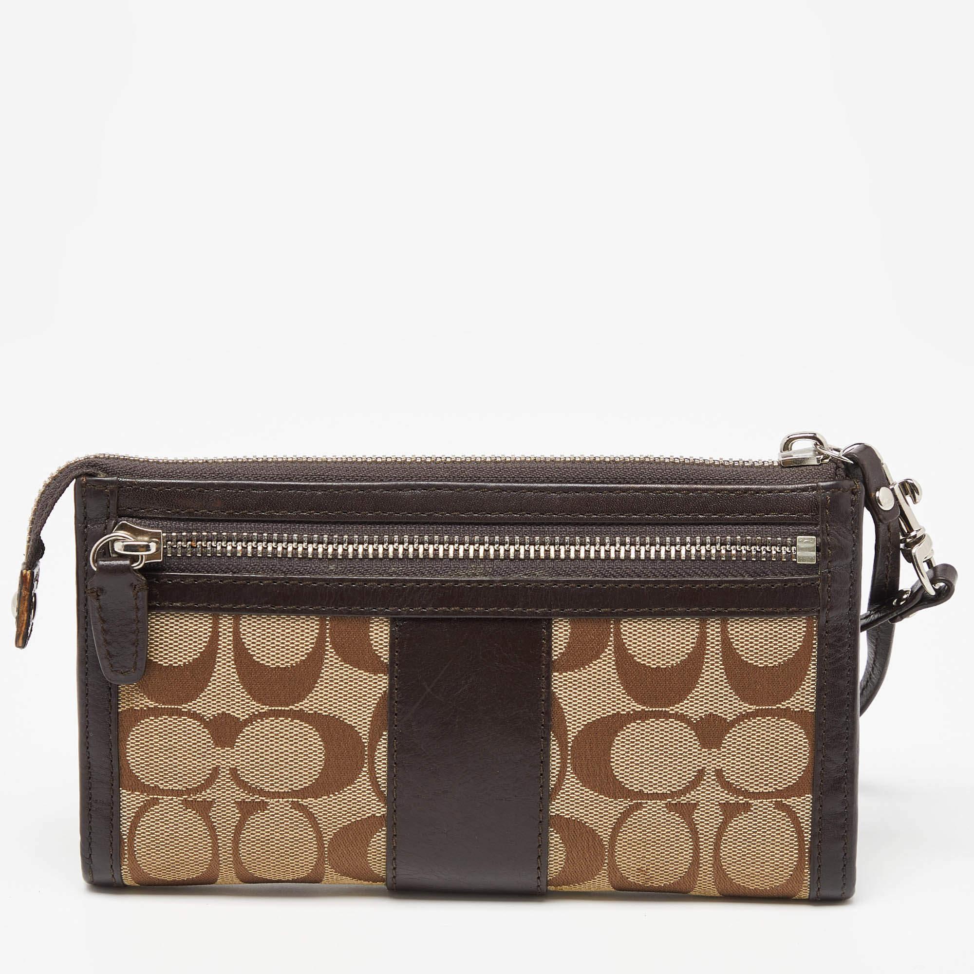 Women's Coach Brown/Beige Signature Canvas and Leather Zip Wristlet Pouch For Sale