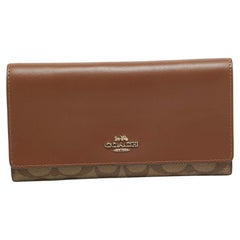 Used Coach Brown/Beige Signature Coated Canvas and Leather Trifold Long Wallet