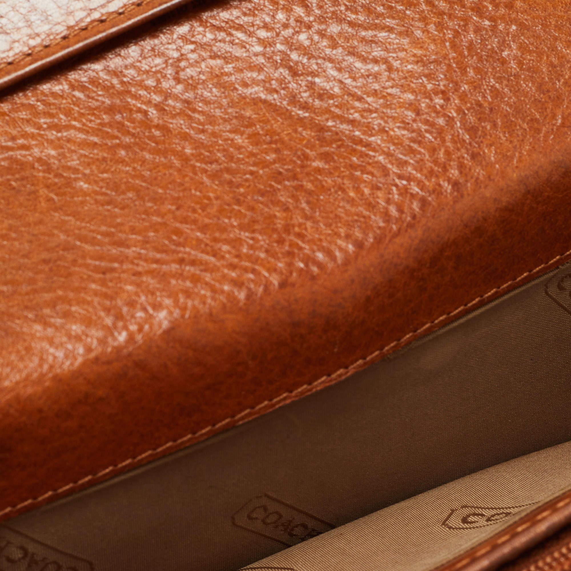 Coach Brown Signature Canvas and Leather Buckle Flap Wallet In Good Condition For Sale In Dubai, Al Qouz 2