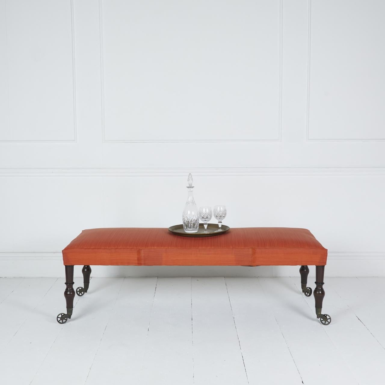 Hand-Crafted Coach-built stool in orange horsehair with English antique legs For Sale