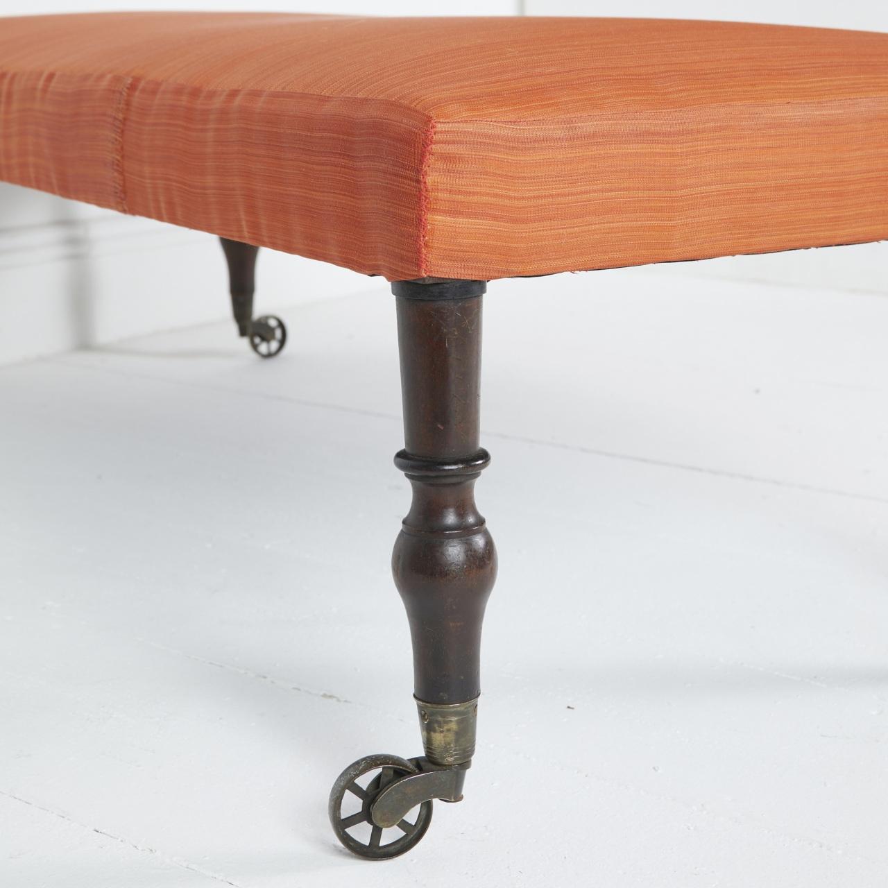 Contemporary Coach-built stool in orange horsehair with English antique legs For Sale