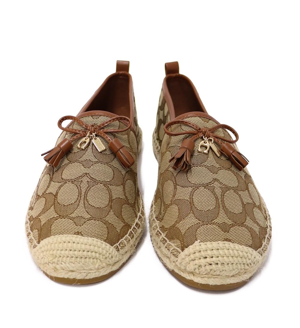 Coach Carson Signature Canvas Espadrille with Cotton lining, Rubber outsole and a Slip on model. 

Material: Canvas.
Size: US 11
Overall Condition: New.
