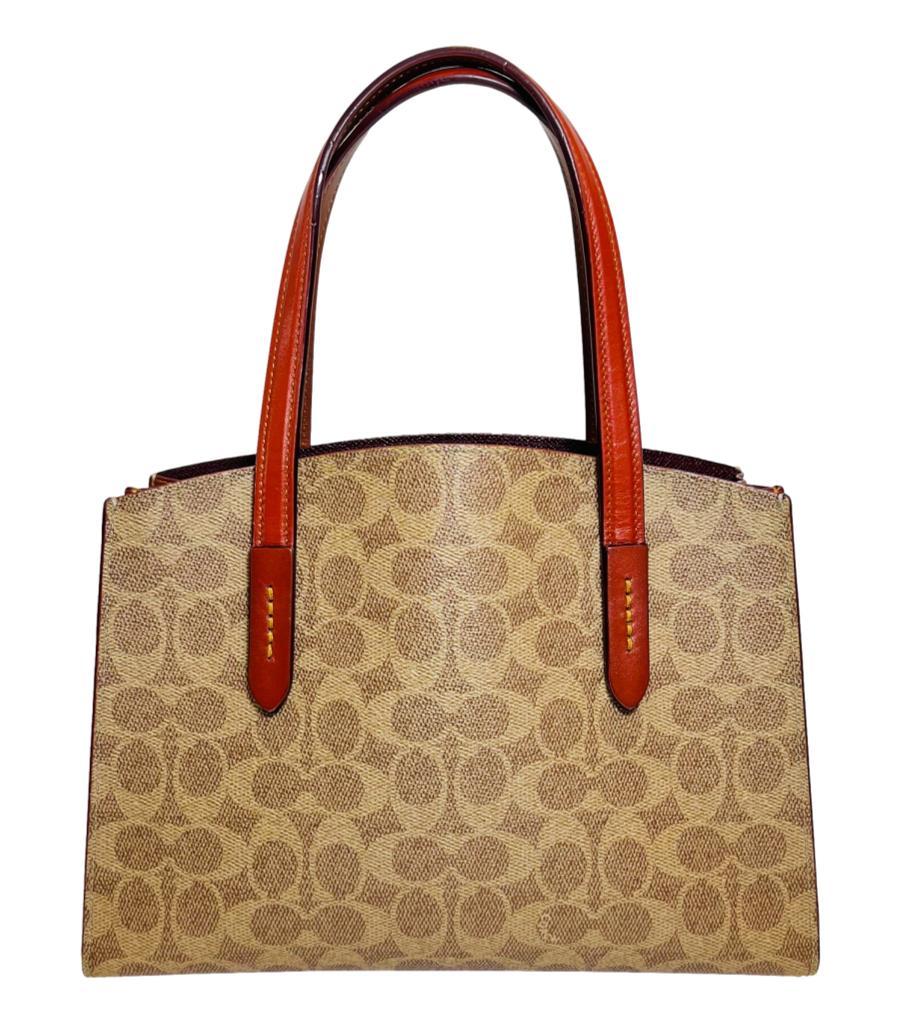 Women's Coach Charlie Carryall 28 Signature Coated Canvas Bag