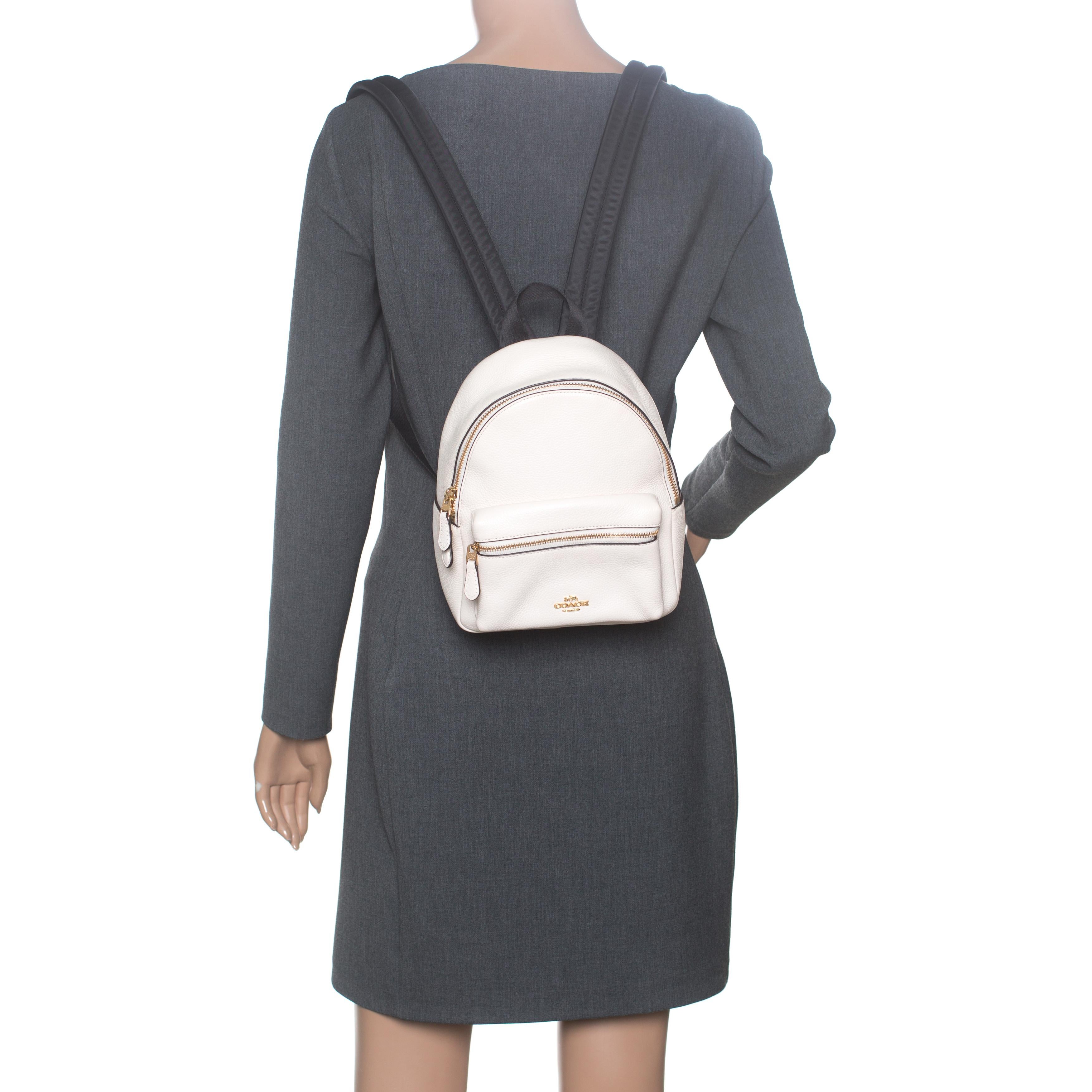 Coach cream canvas and black leather backpack hotsell